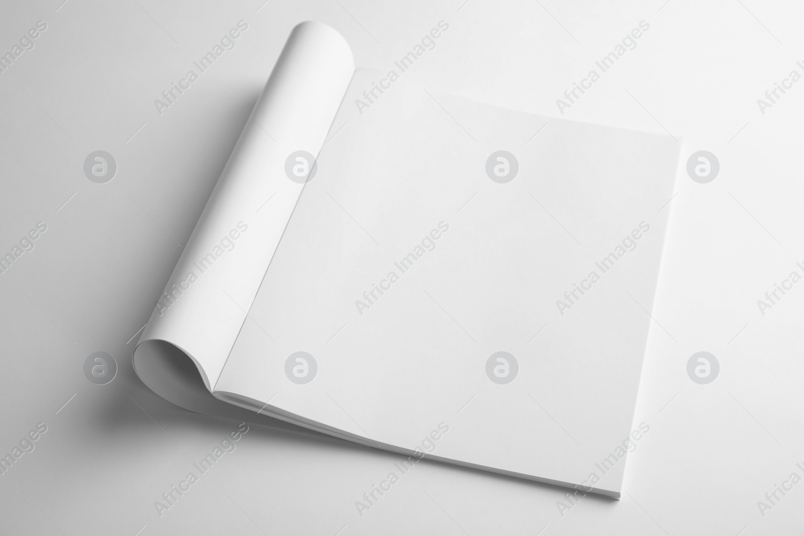 Photo of Blank book on white background. Mock up for design