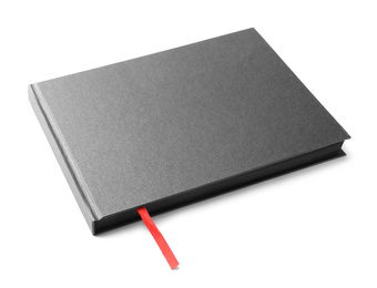 Photo of Stylish black hardcover notebook isolated on white
