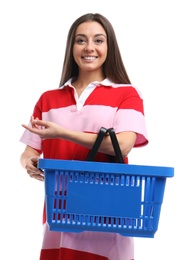 Photo of Young woman with empty shopping basket isolated on white