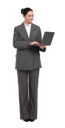 Photo of Beautiful businesswoman using laptop on white background