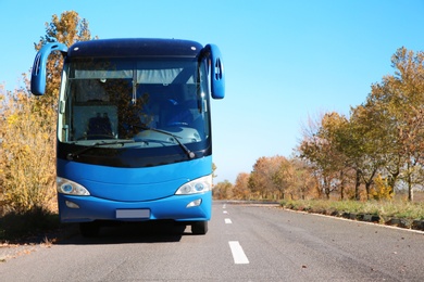 Modern blue bus on road. Passenger transportation