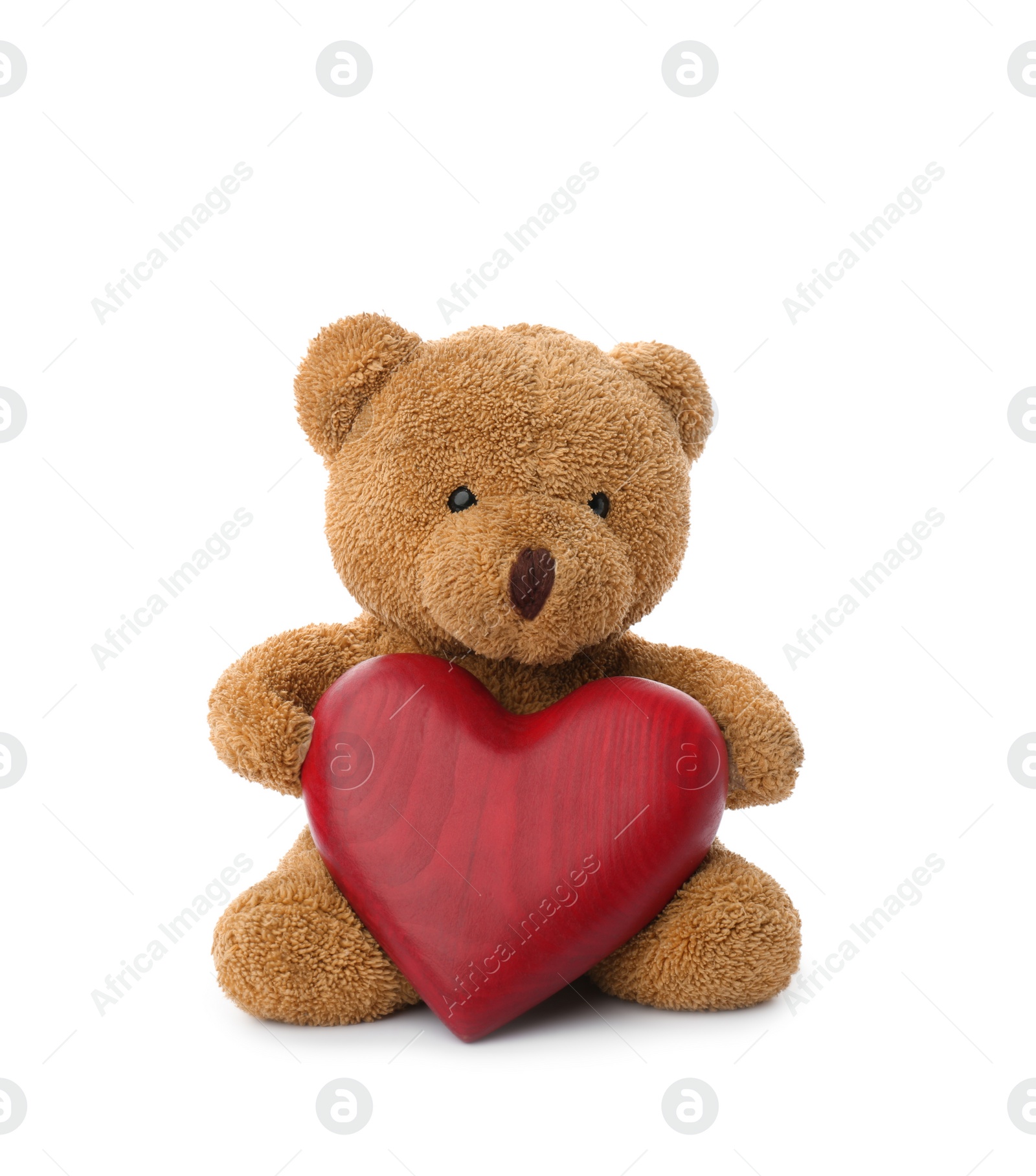 Photo of Cute teddy bear with red heart isolated on white. Valentine's day celebration