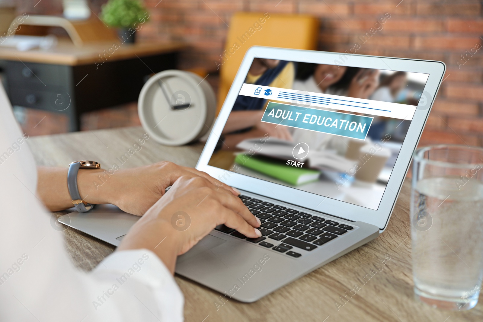 Image of Woman using laptop for online studying indoors, closeup. Adult education 