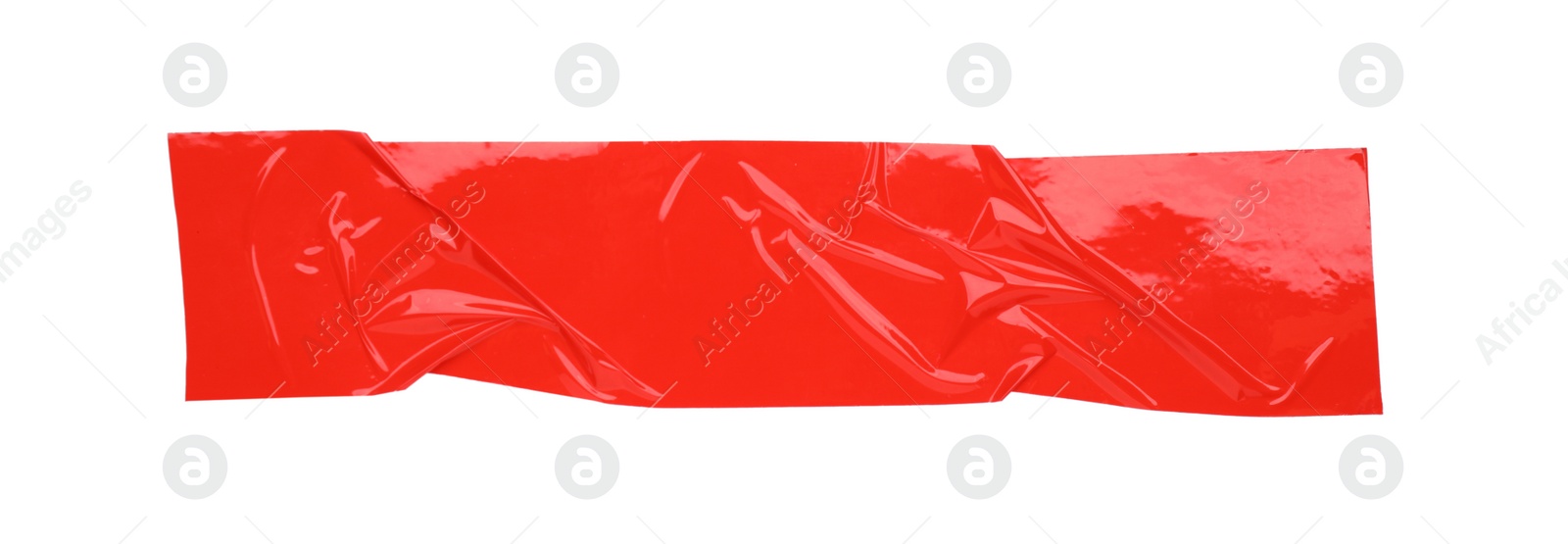 Photo of Piece of red adhesive tape isolated on white, top view