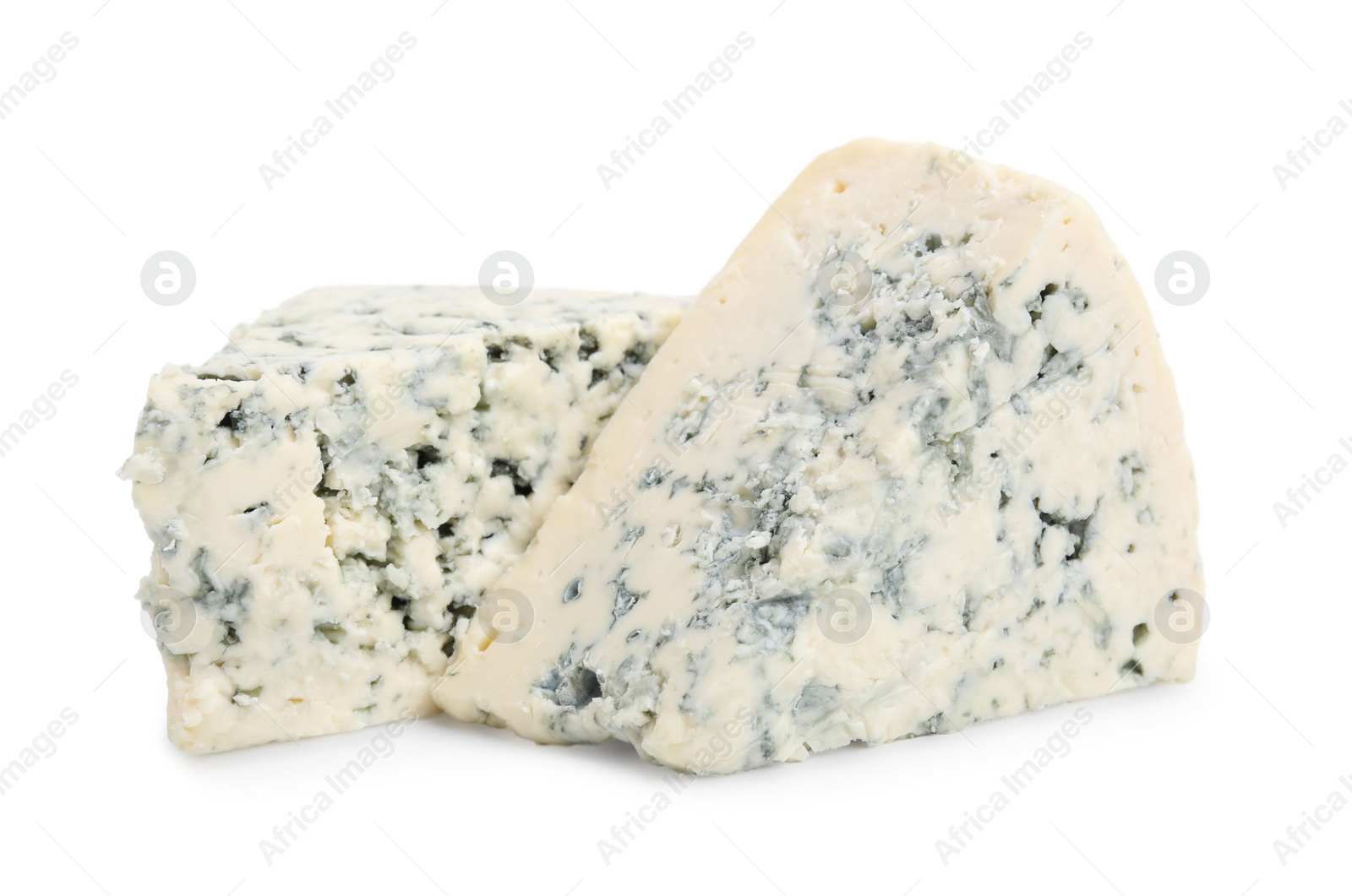 Photo of Pieces of delicious blue cheese isolated on white