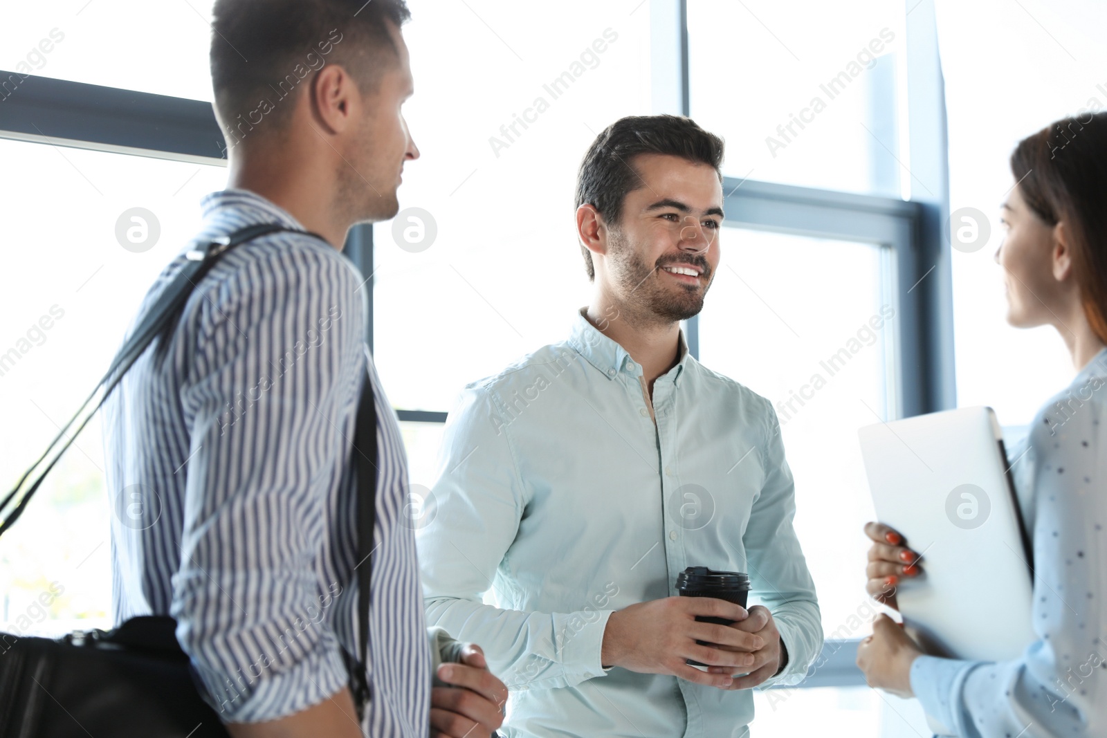 Photo of Office employees having business training at workplace