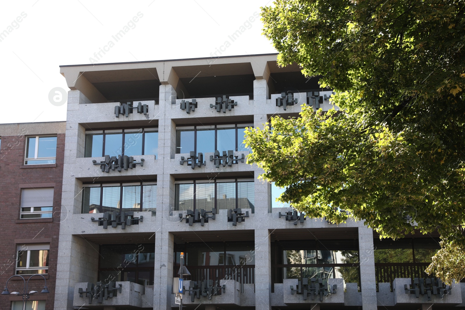 Photo of Cologne, Germany - August 28, 2022: Beautiful residential buildings on city street