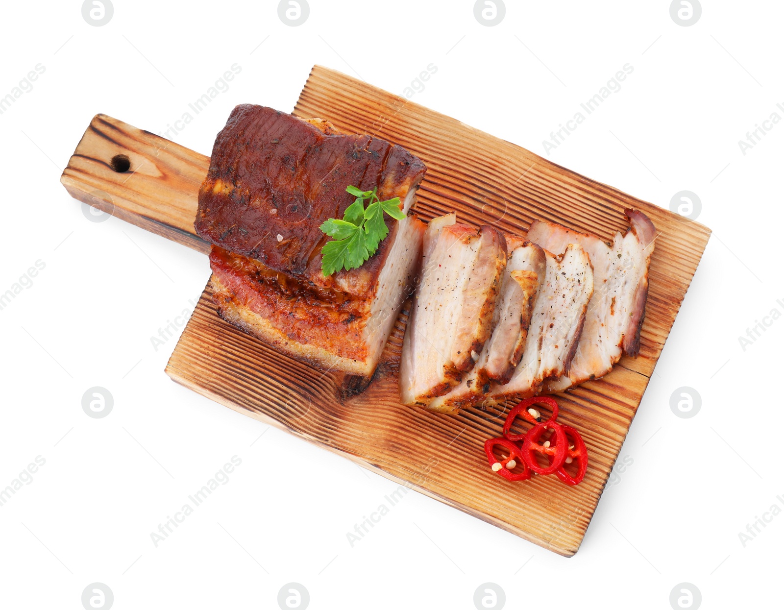 Photo of Pieces of tasty baked pork belly and chili pepper isolated on white, top view