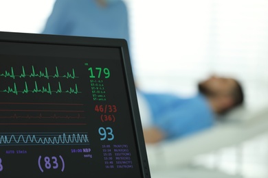 Photo of Monitor with cardiogram in hospital, focus on screen. Space for text