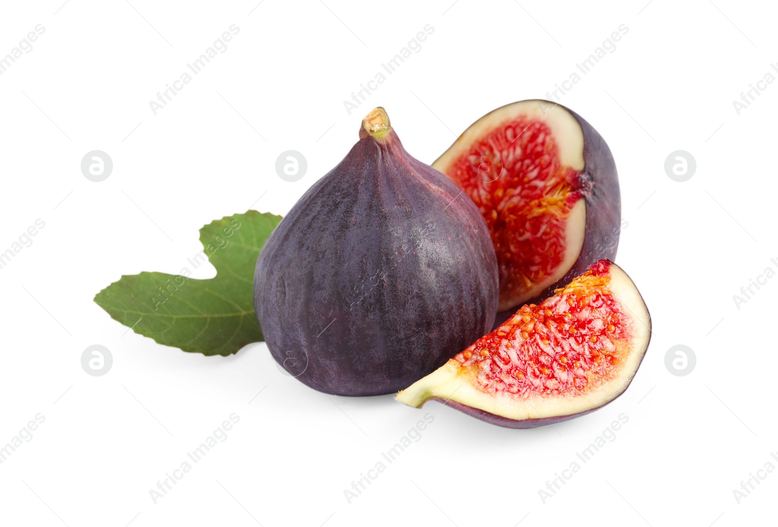 Photo of Cut and whole ripe figs isolated on white