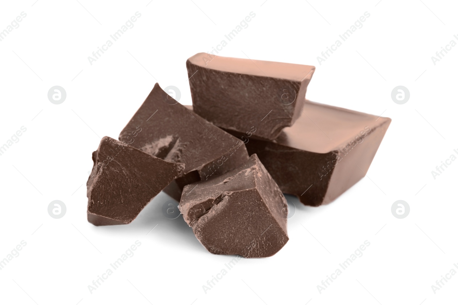 Photo of Pieces of milk chocolate isolated on white