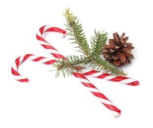 Photo of Composition with Christmas candy canes on white background