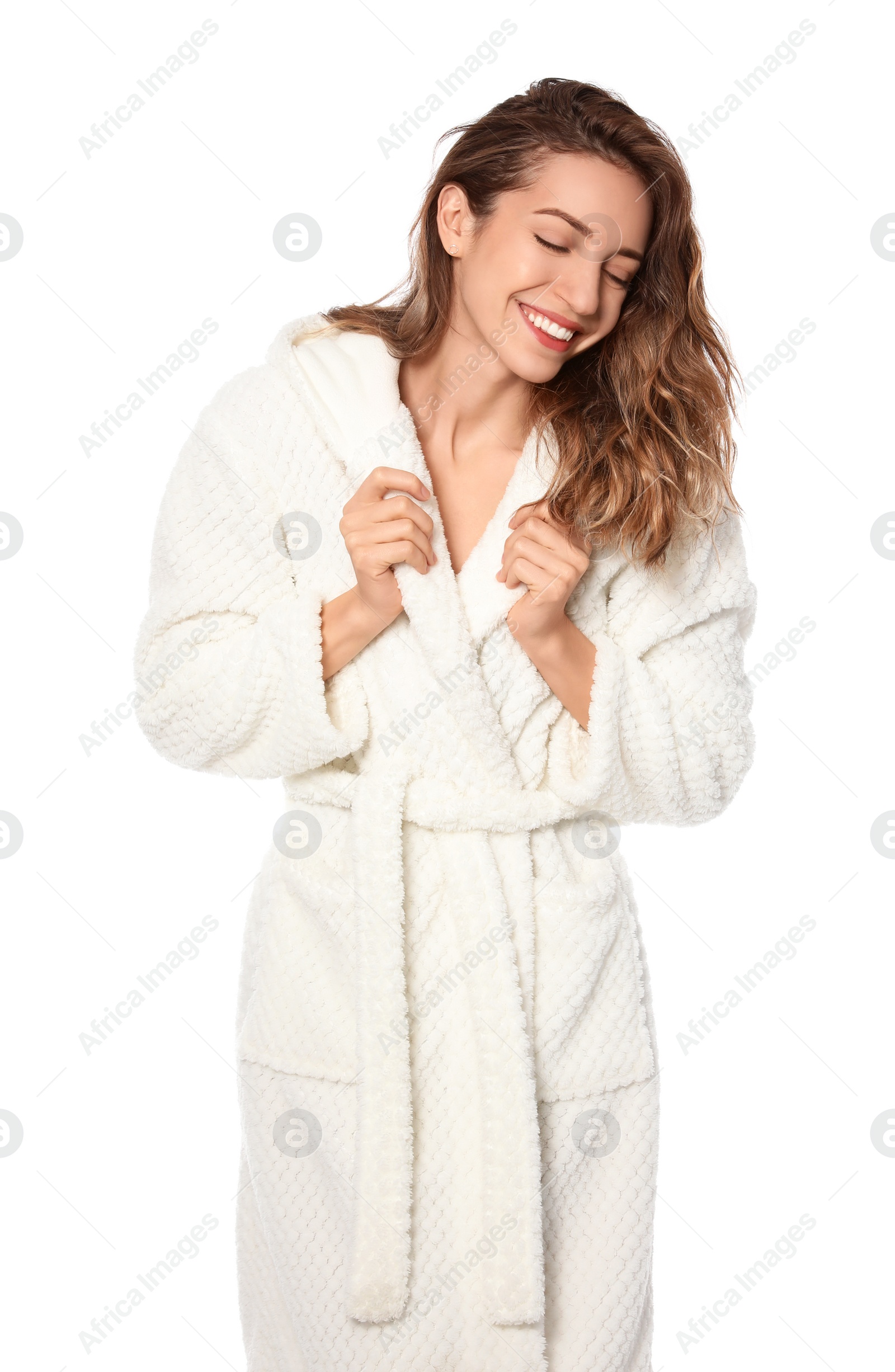 Photo of Beautiful young woman wearing bathrobe on white background