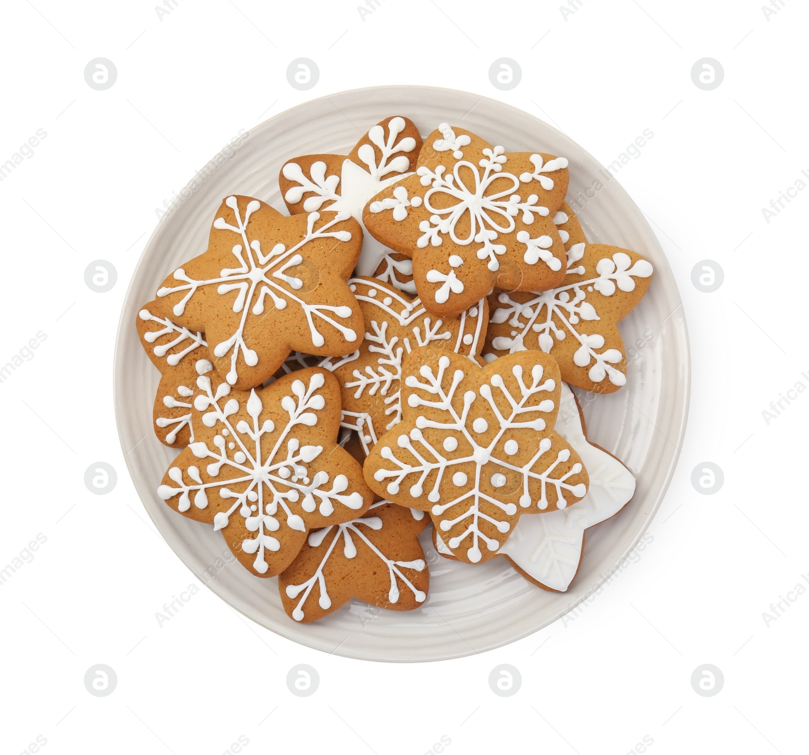 Photo of Tasty star shaped Christmas cookies with icing isolated on white, top view