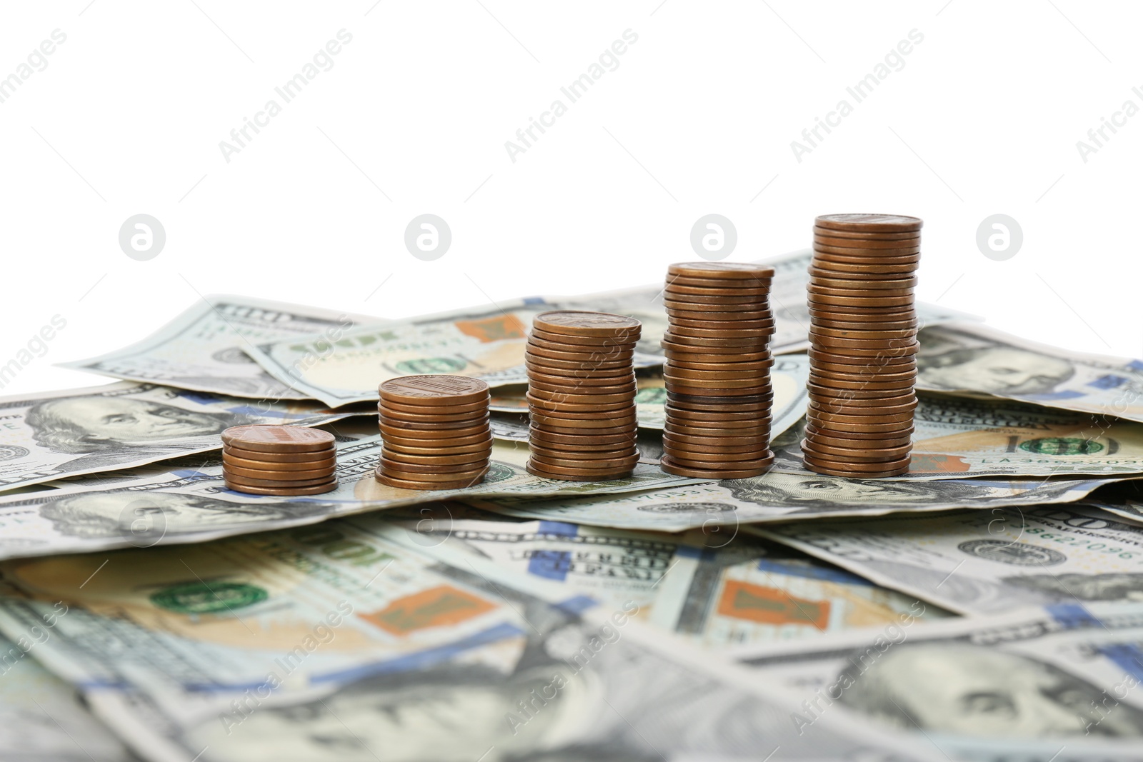 Photo of Dollar bills and coins on white background