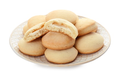 Plate with cookies for Islamic holidays isolated on white. Eid Mubarak