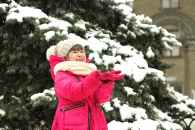 Photo of Portrait of little girl outdoors on snowy day