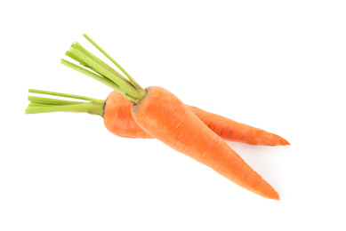 Photo of Fresh ripe juicy carrots isolated on white, top view