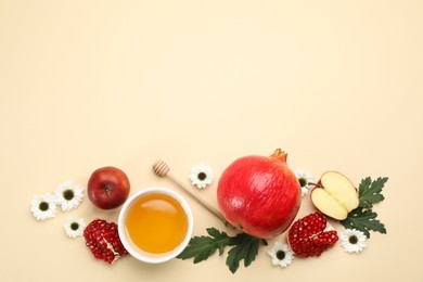 Photo of Flat lay composition with Rosh Hashanah holiday attributes on beige background. Space for text