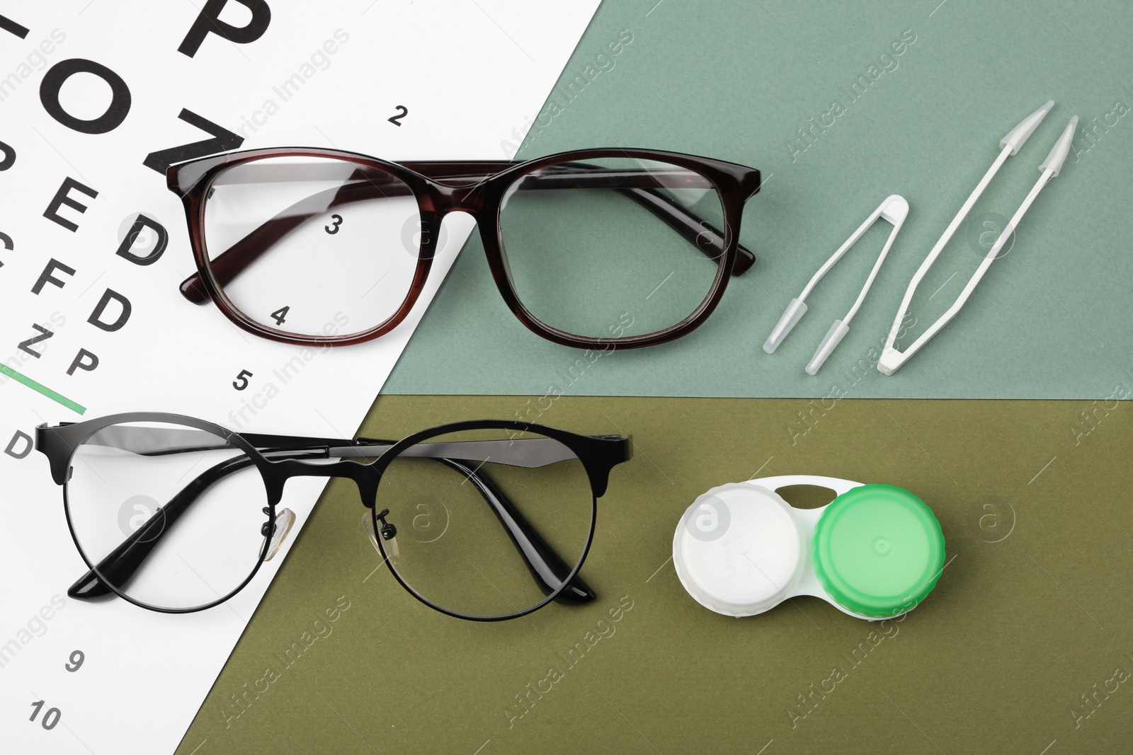 Photo of Vision test chart, glasses, lenses and tweezers on color background, flat lay