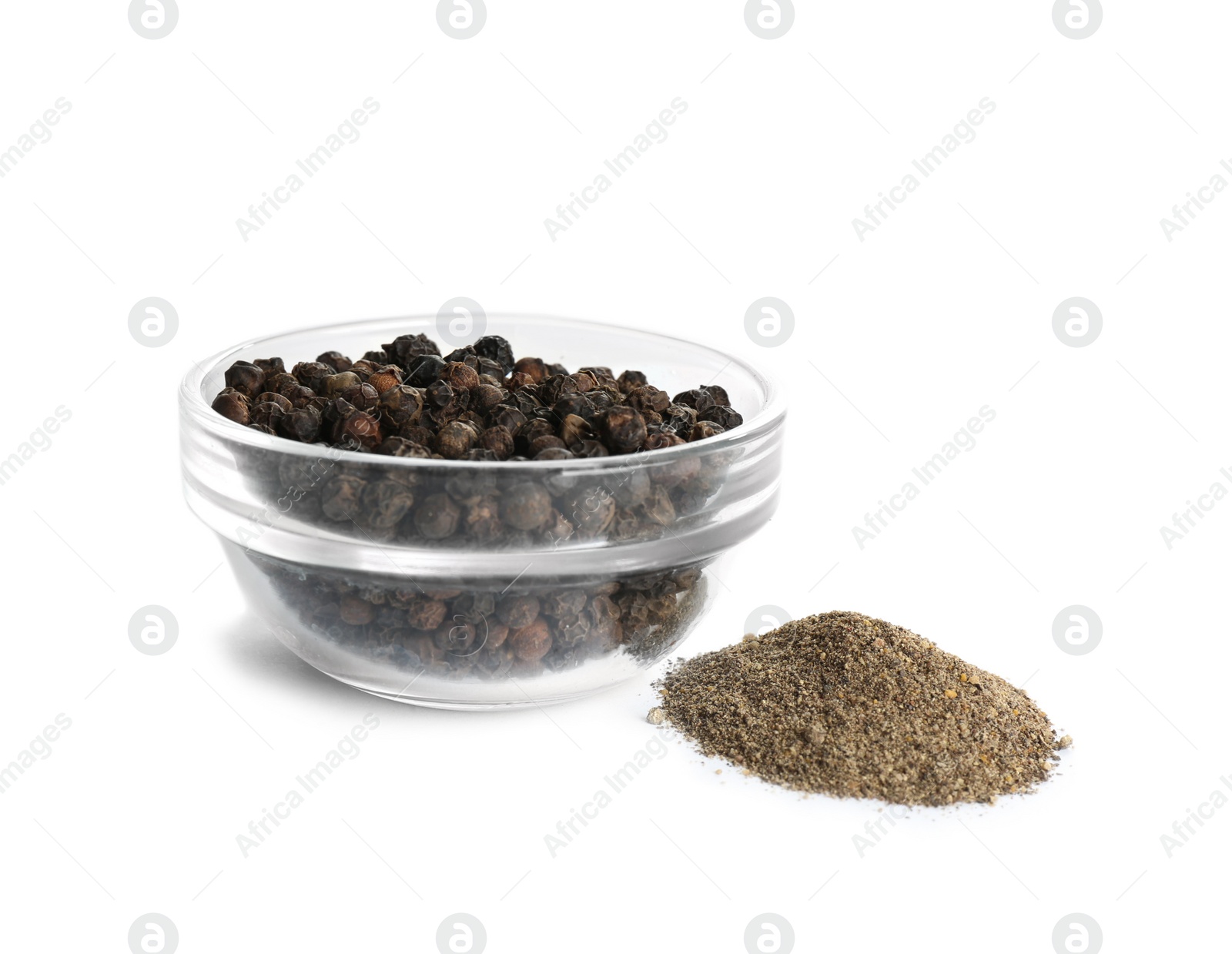 Photo of Ground black pepper and corns isolated on white