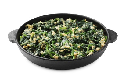 Photo of Tasty spinach dip with eggs in dish isolated on white