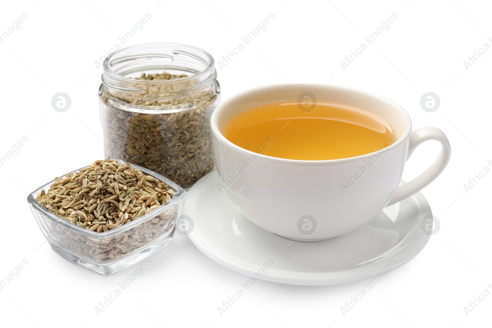 Photo of Aromatic fennel tea in cup and seeds isolated on white