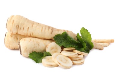 Photo of Tasty fresh ripe parsnips on white background