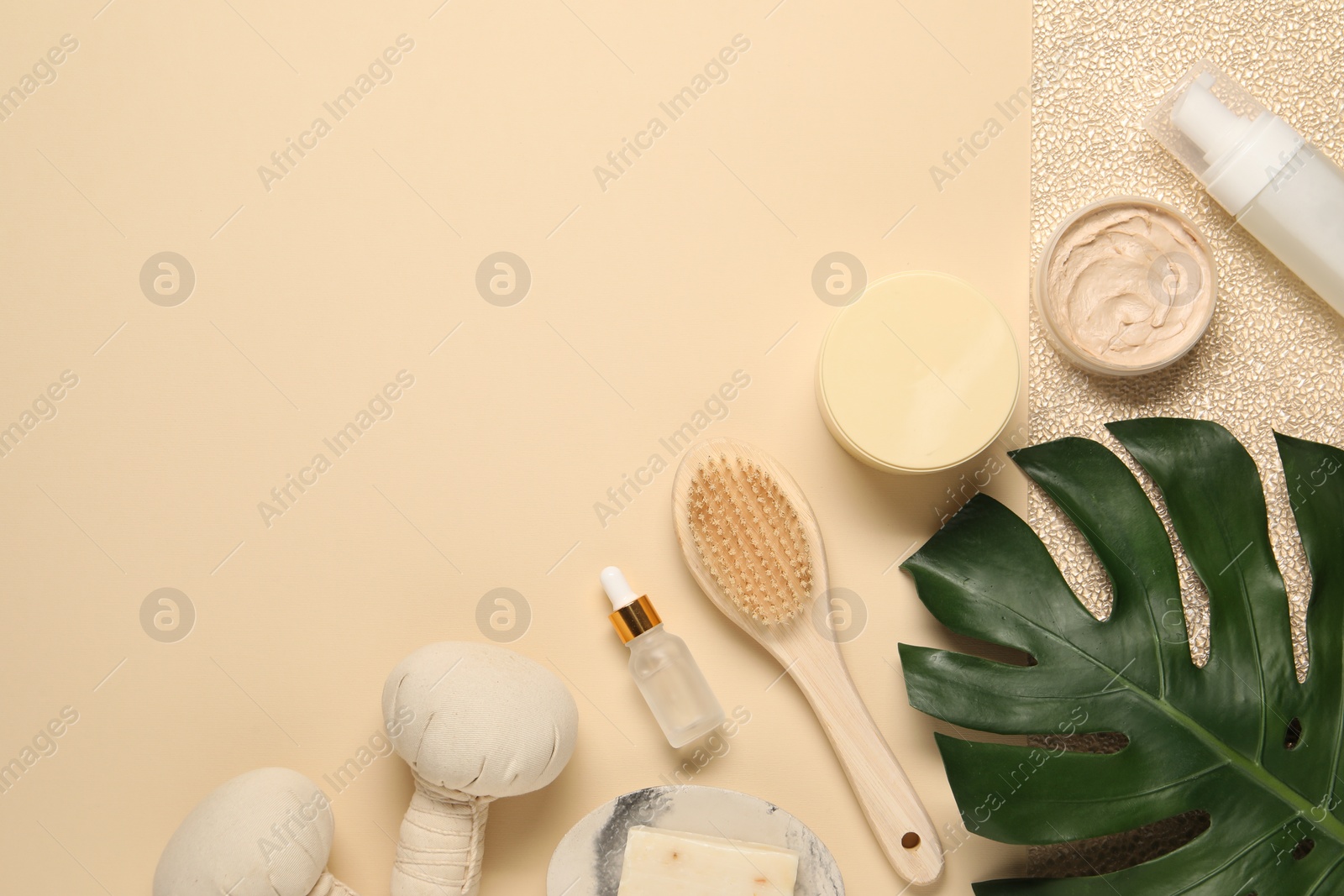Photo of Bath accessories. Flat lay composition with personal care products on beige background, space for text