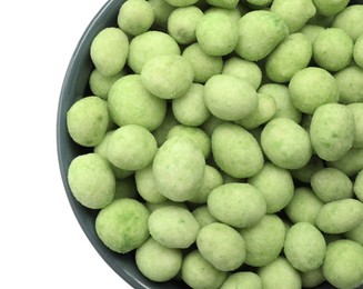 Tasty wasabi coated peanuts in bowl on white background, top view