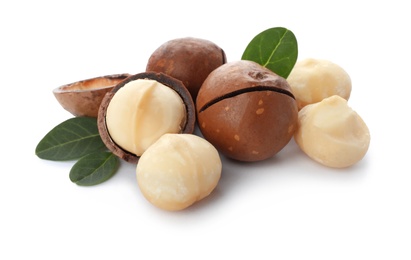 Pile of organic Macadamia nuts on white background