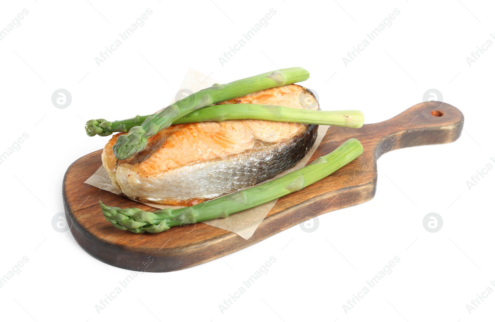 Photo of Tasty salmon steak with asparagus isolated on white