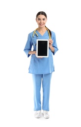Photo of Full length portrait of medical assistant with stethoscope and tablet on white background. Space for text