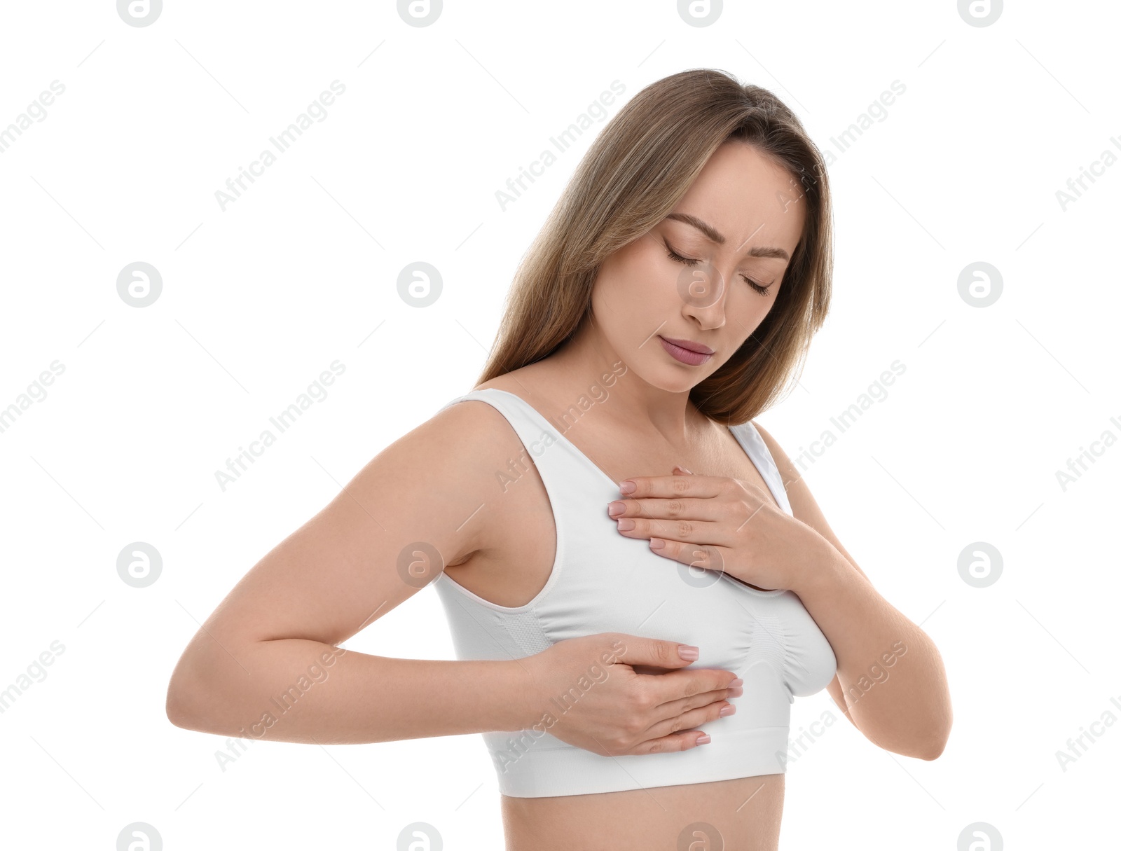 Photo of Mammology. Young woman doing breast self-examination on white background