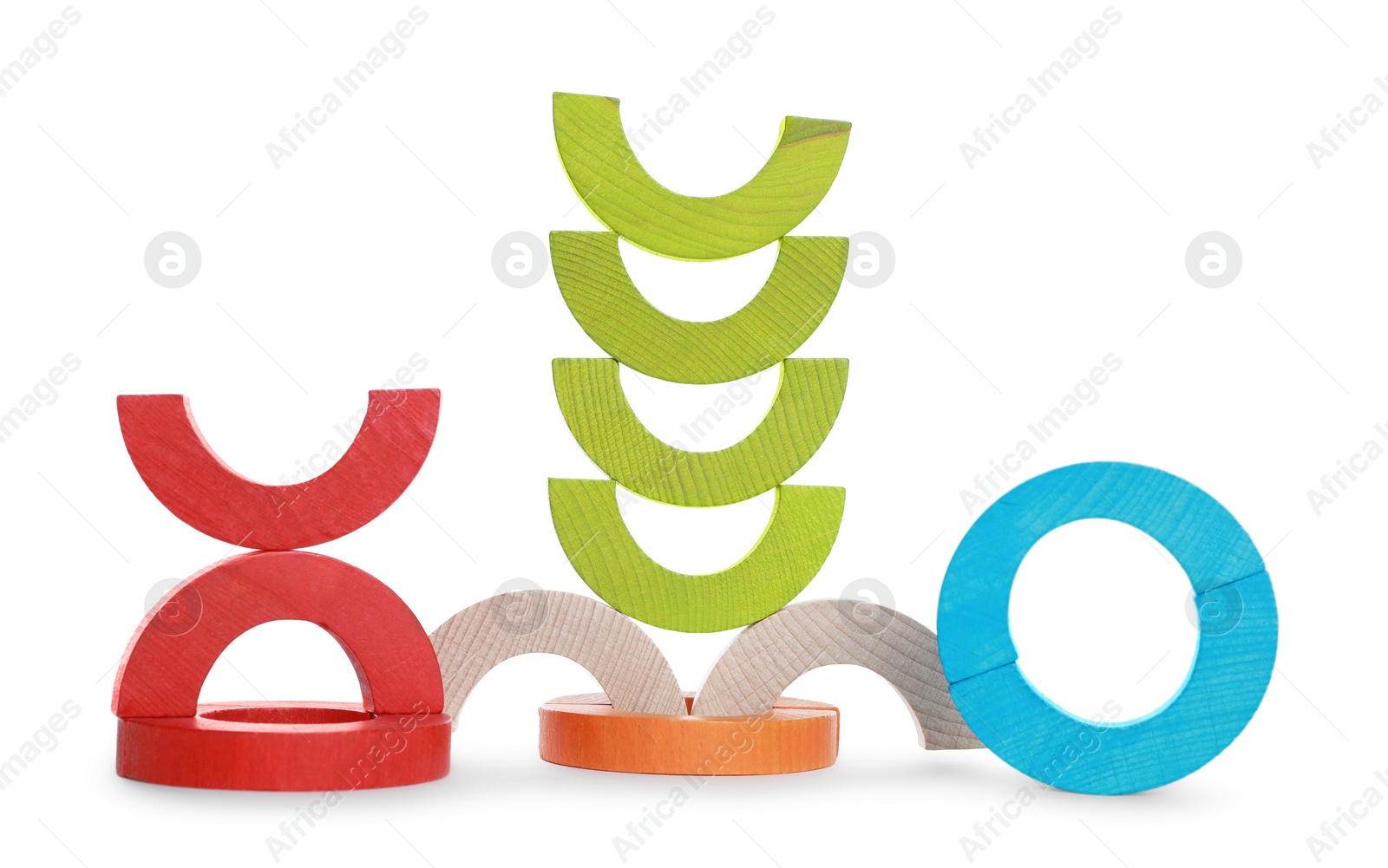 Photo of Colorful wooden pieces of play set isolated on white. Educational toy for motor skills development