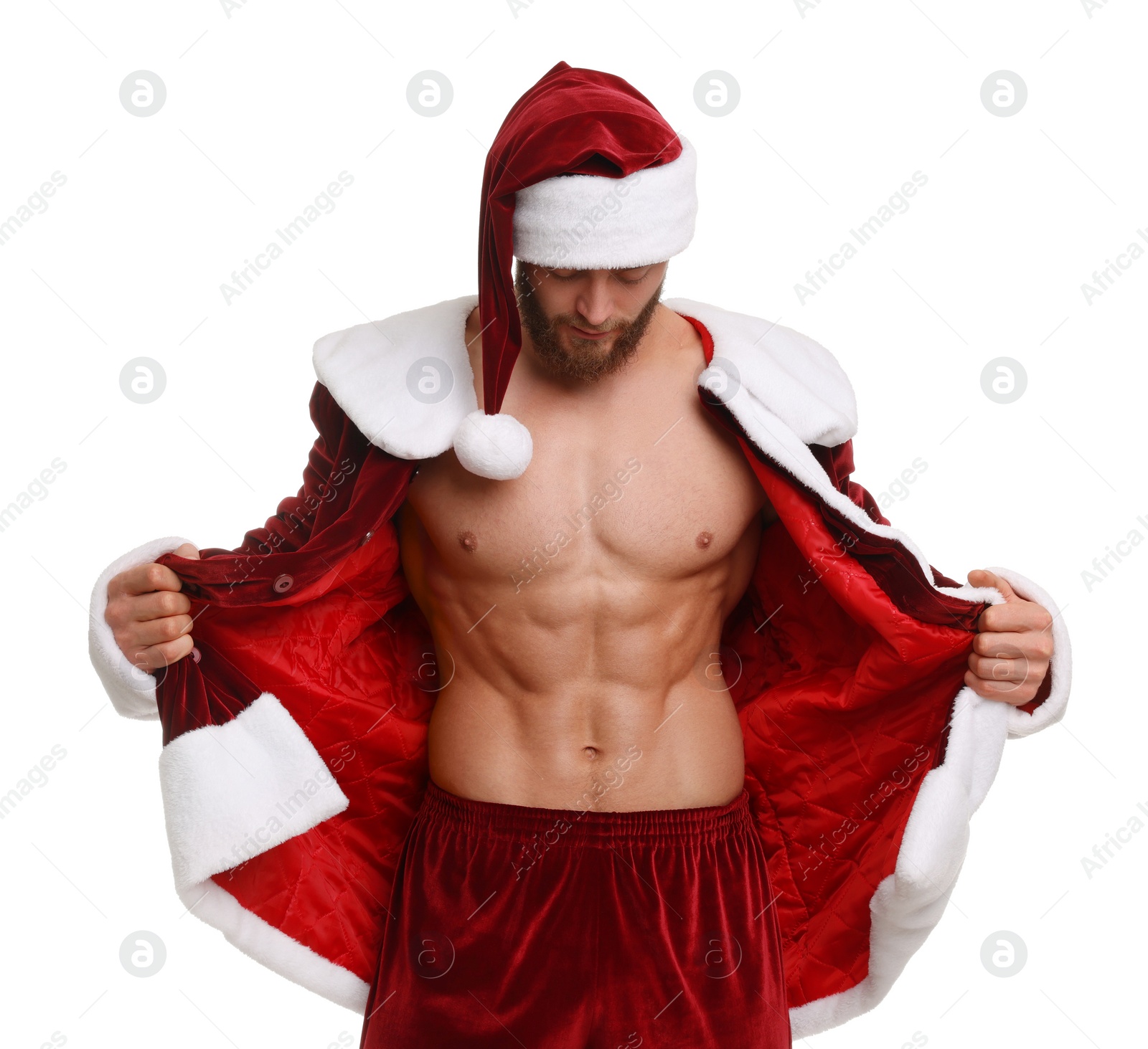 Photo of Attractive young man with muscular body in Santa costume on white background