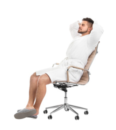 Photo of Handsome man wearing bathrobe on white background