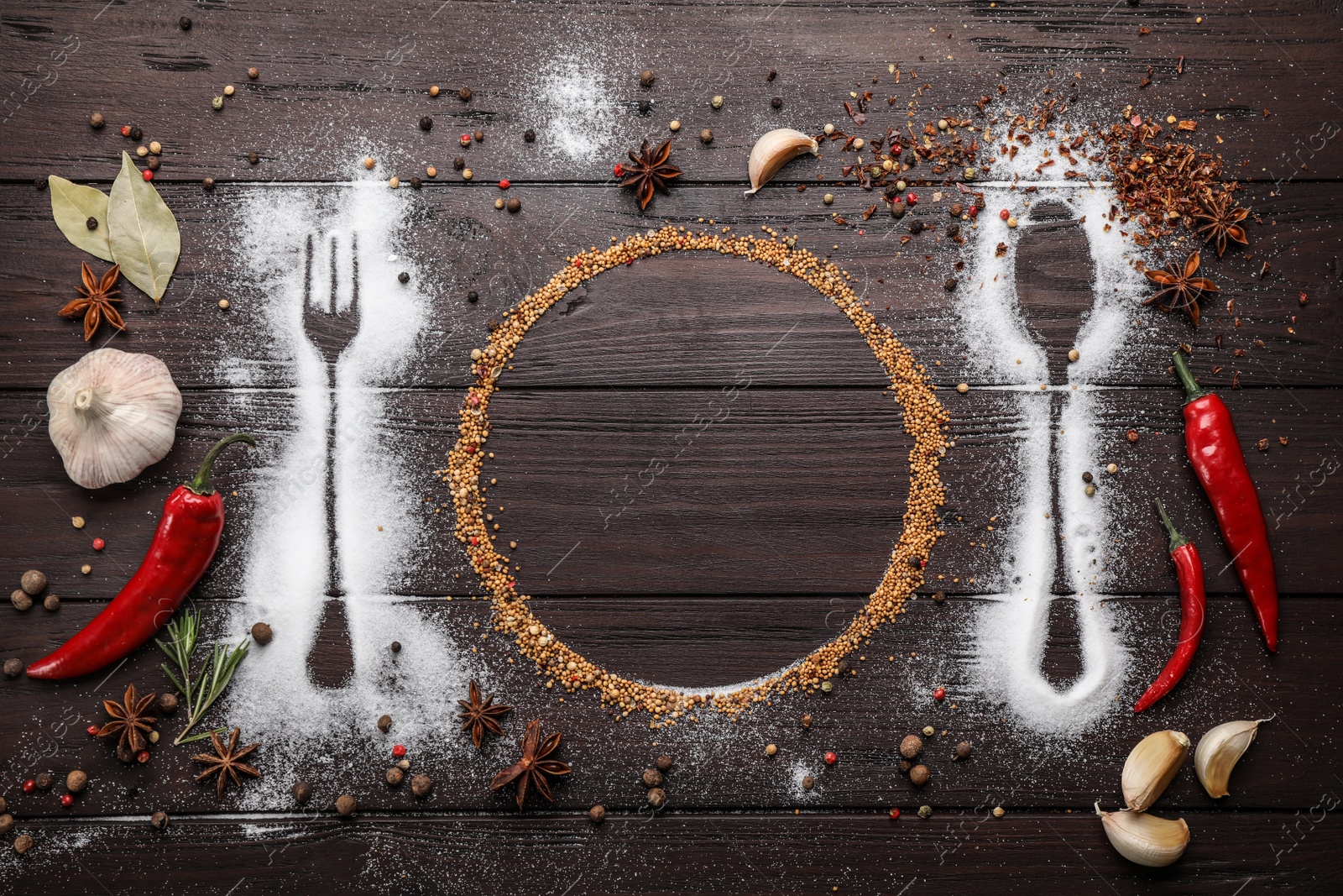 Photo of Beautiful flat lay composition with different spices, silhouettes of cutlery and plate on wooden background. Space for text