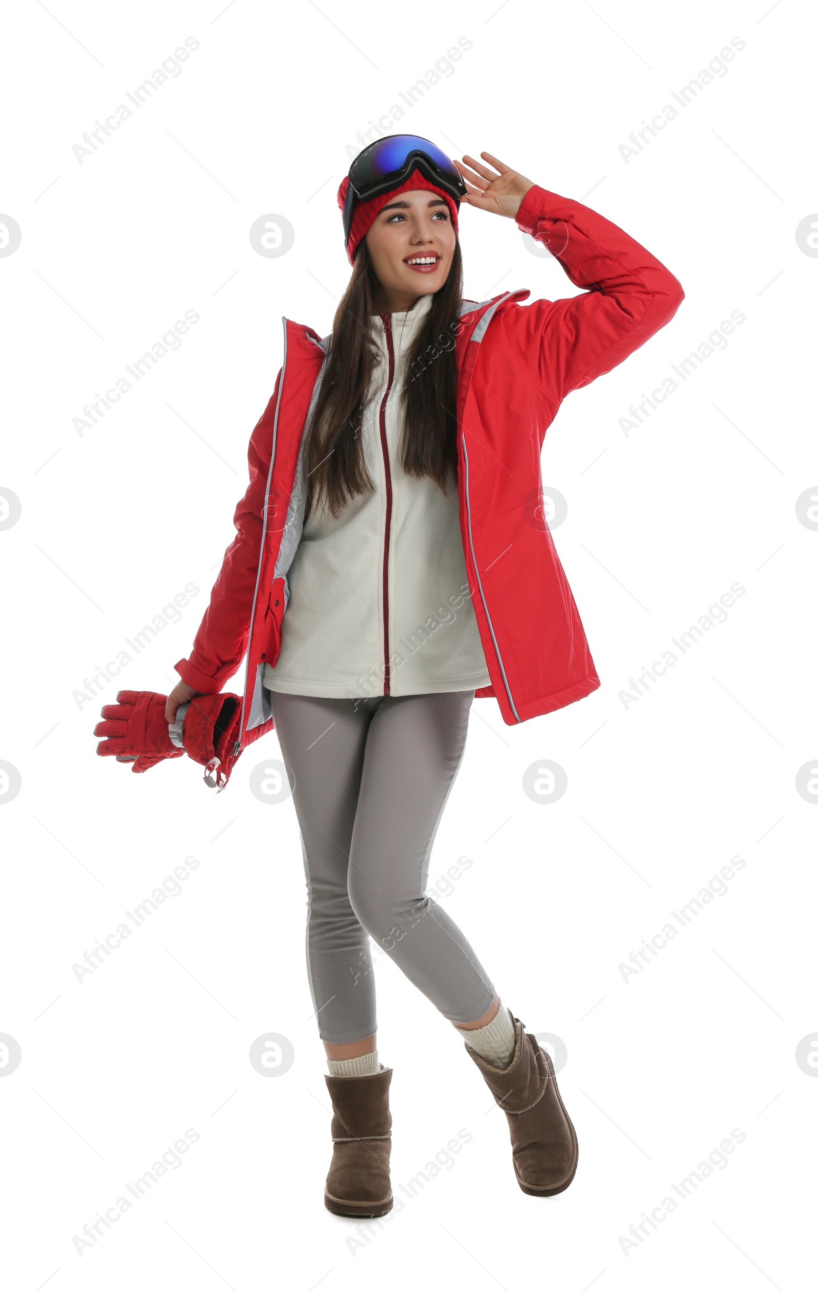 Photo of Woman wearing stylish winter sport clothes on white background