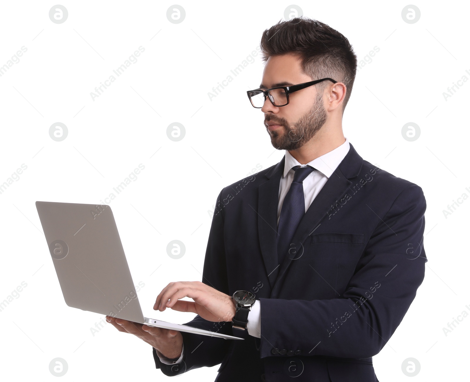 Photo of Young businessman with laptop on white background