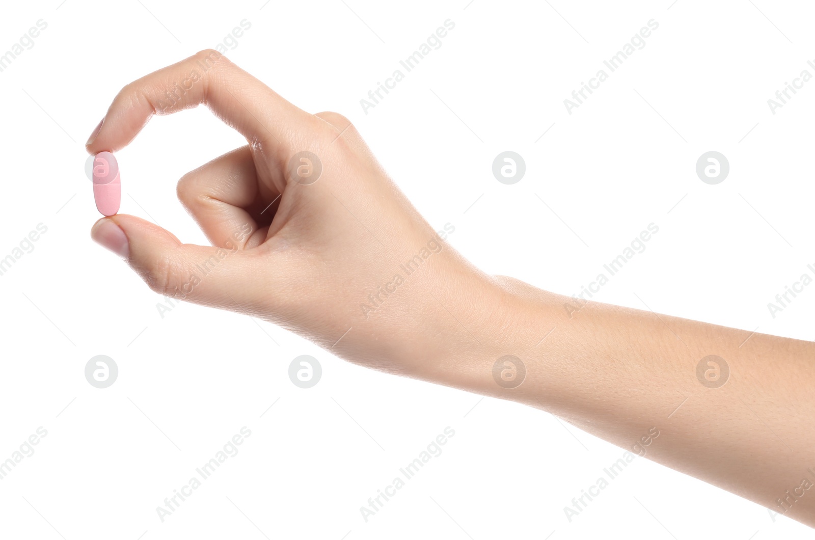 Photo of Woman holding color pill on white background, closeup