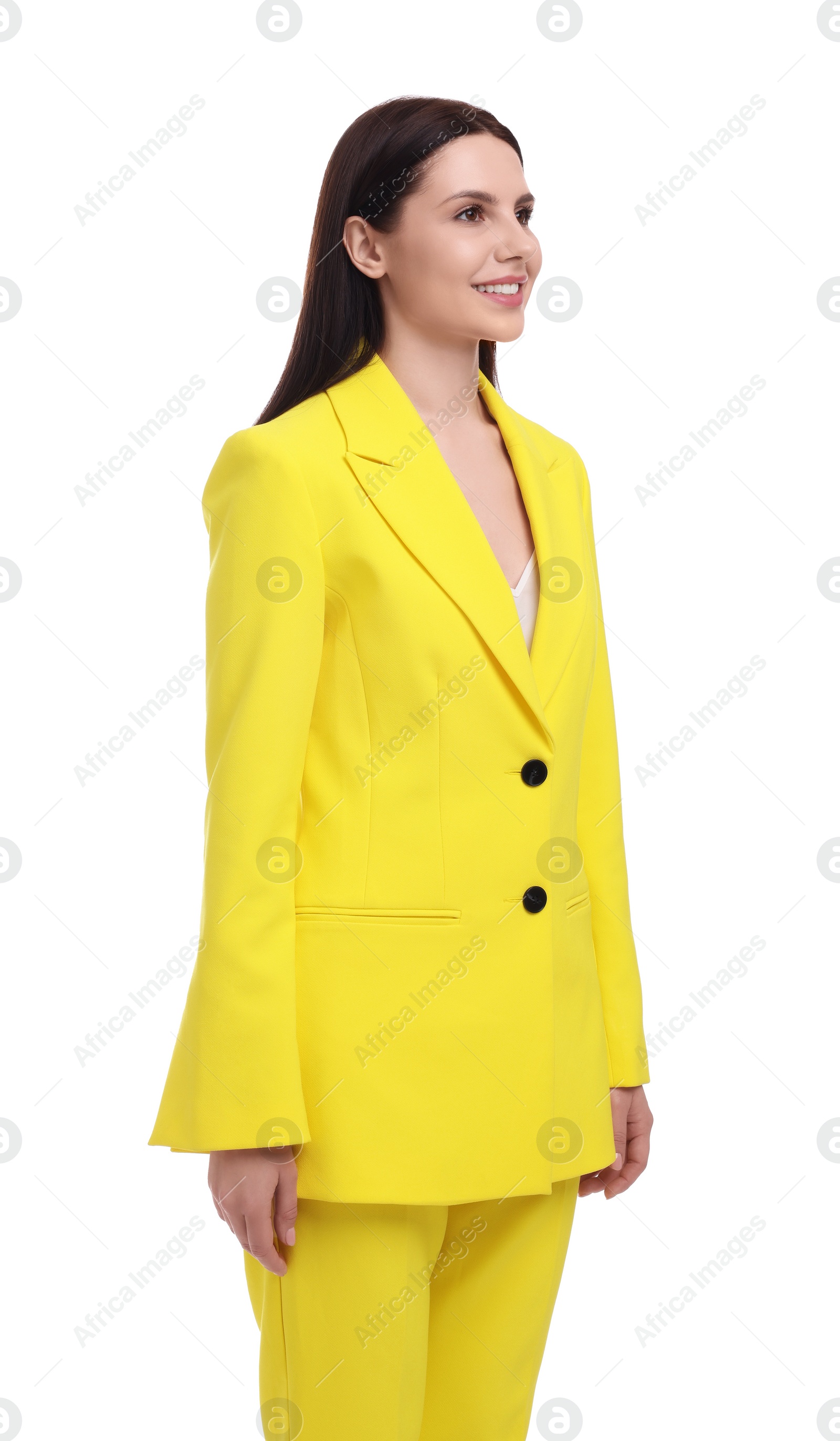 Photo of Beautiful businesswoman in yellow suit on white background