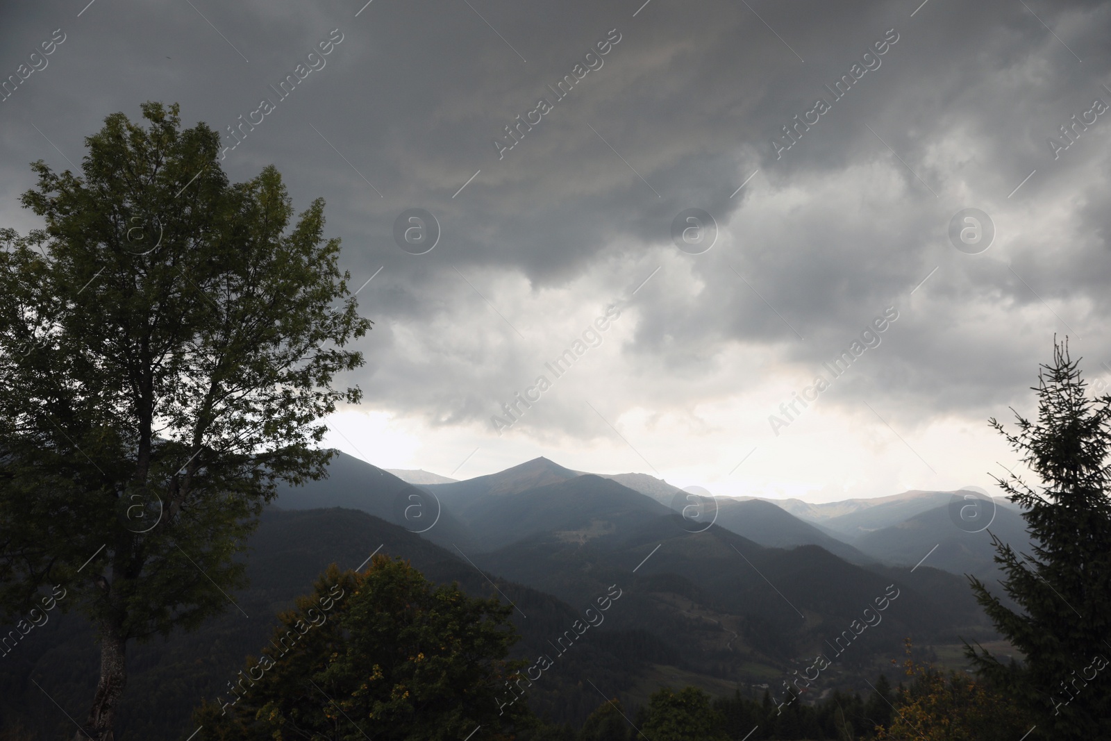 Photo of Picturesque view of cloudy sky over mountains