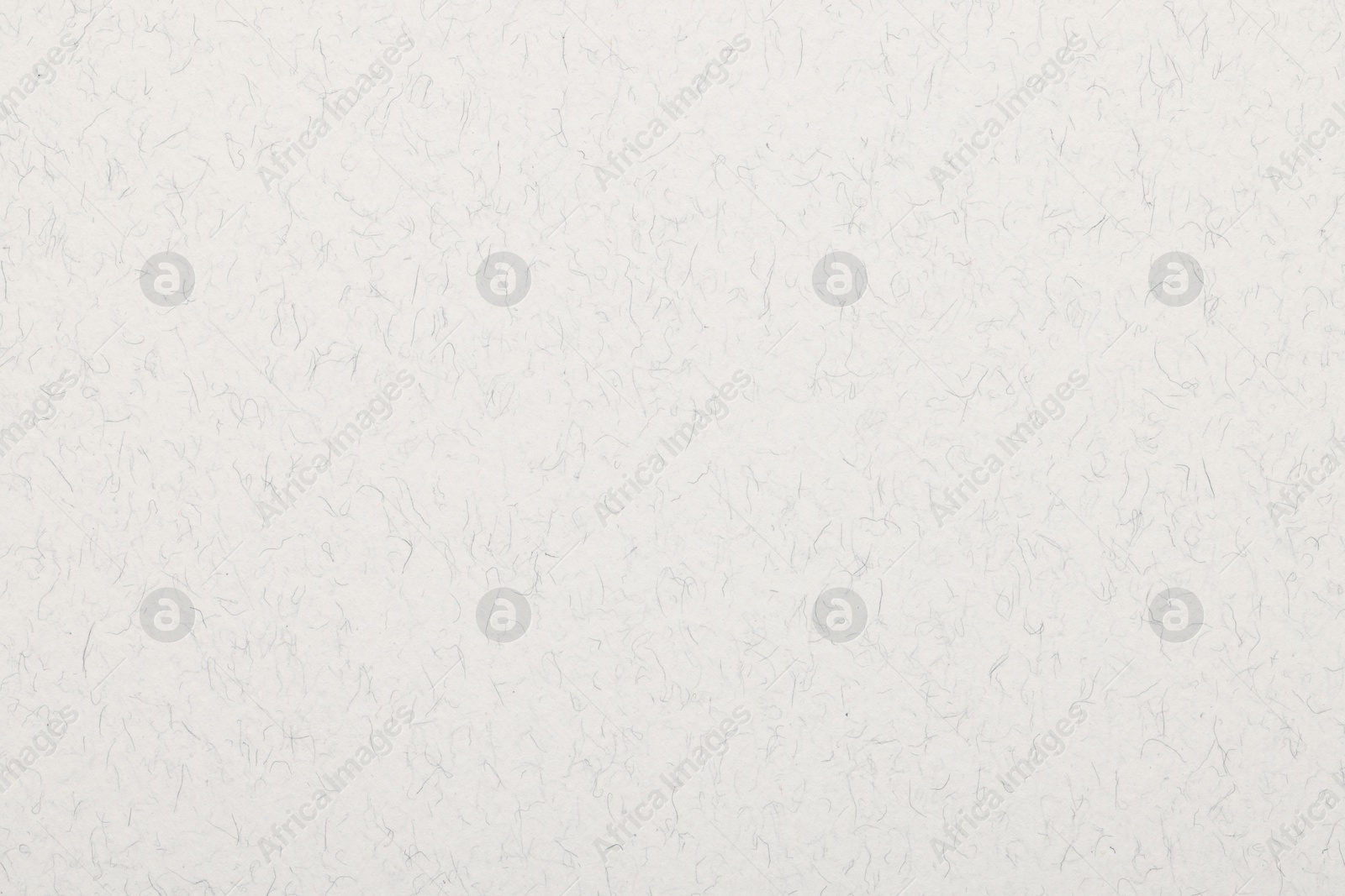 Photo of Texture of white paper sheet as background, top view