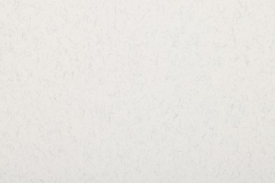 Photo of Texture of white paper sheet as background, top view