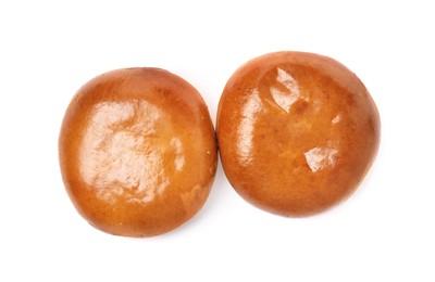 Photo of Delicious baked pirozhki on white background, top view
