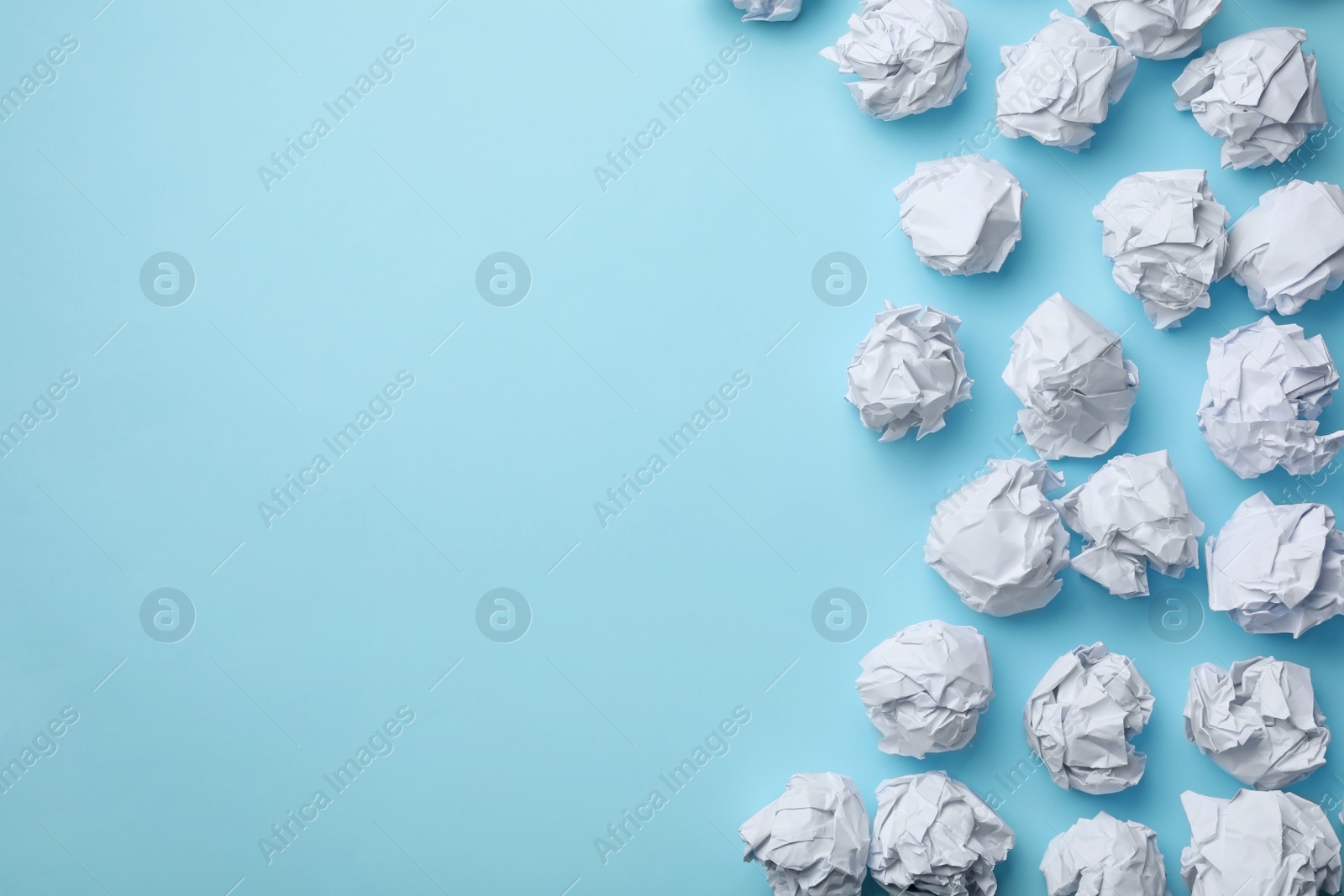 Photo of Frame made of paper balls on color background, flat lay. Space for text