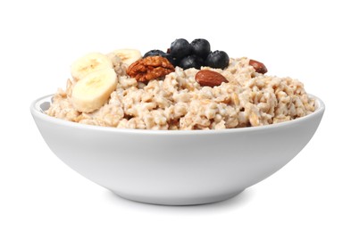 Photo of Tasty boiled oatmeal with blueberries, banana and nuts in bowl isolated on white