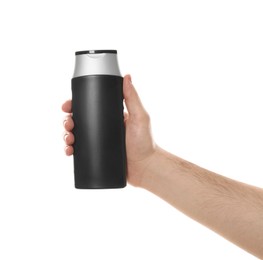 Man holding bottle of shower gel on white background, closeup. Mockup for design