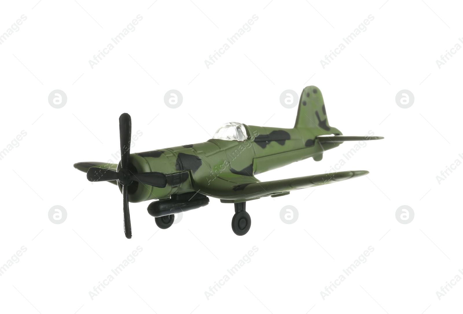 Photo of Vintage toy military airplane on white background